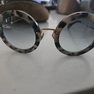 Miu Miu Tortoise Shell Sunglasses with Gold Accents